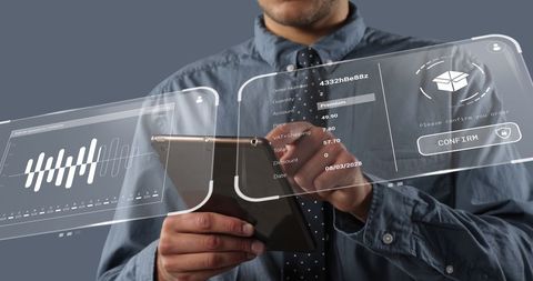Businessman Using Digital Tablet with Holographic Data Interface - Download Free Stock Images Pikwizard.com