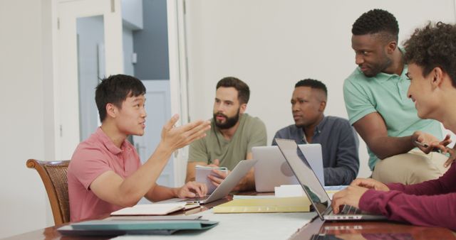 Multiracial Team Collaborating at Office Meeting - Download Free Stock Images Pikwizard.com