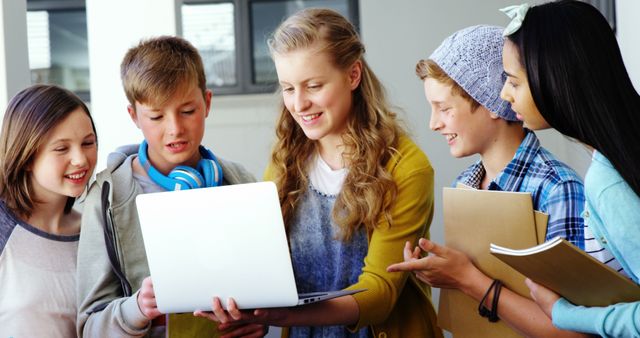 Group of Diverse Teen Friends Working on Laptop Together Outdoors - Download Free Stock Images Pikwizard.com