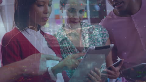 Diverse Team Analyzing Financial Data on Tablet in Modern Office