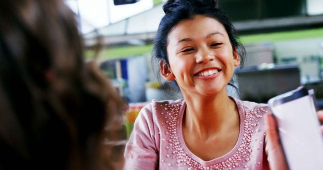 Joyful Conversation with Asian Girl in Cafe Setting - Download Free Stock Images Pikwizard.com