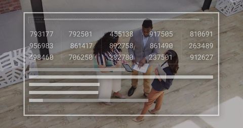 Business team analyzing data with view from above