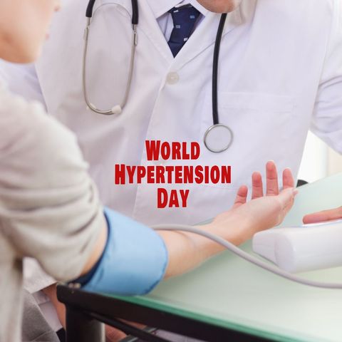 world hypertension day: doctor checking blood pressure - Download Free Stock Templates Pikwizard.com