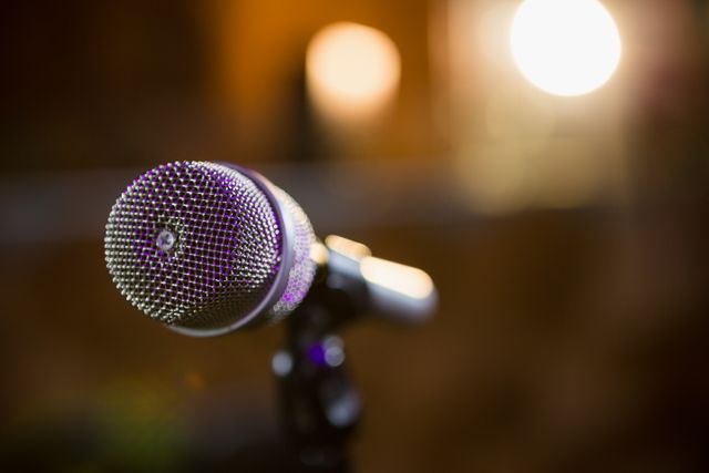 Close-Up of Microphone in Bar with Blurred Background - Download Free Stock Photos Pikwizard.com