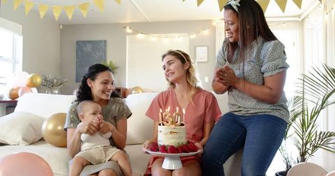 Diverse Friend Group Celebrating Birthday with Cake and Baby