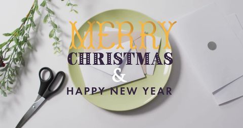 Creative christmas greeting with envelopes and scissors