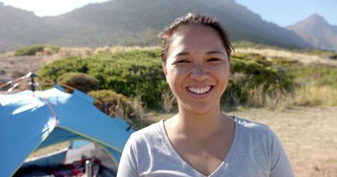 Joyful Solo Camper in Beautiful Mountain Landscape