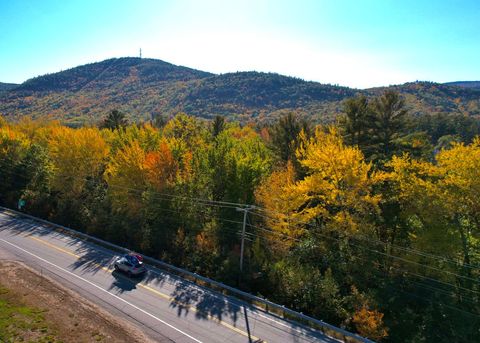 Scenic autumn drive through forested mountain road
