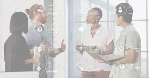 Collaborating on ar analytics: four professionals reviewing business data in glass office
