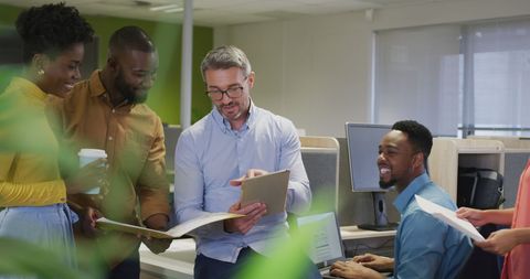 Collaborative Diverse Team Engaging in Productive Office Meeting