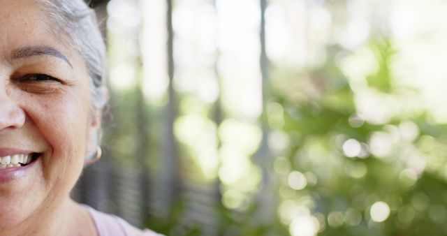 Elderly Woman Joyful in Sunlit Garden Oasis - Download Free Stock Images Pikwizard.com