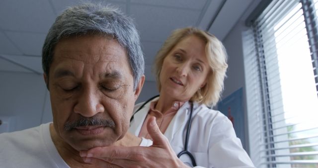 Senior Man Receiving Medical Checkup from Female Doctor - Download Free Stock Images Pikwizard.com