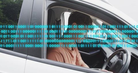 Young driver checking center console inside parked car with cyan binary code overlay