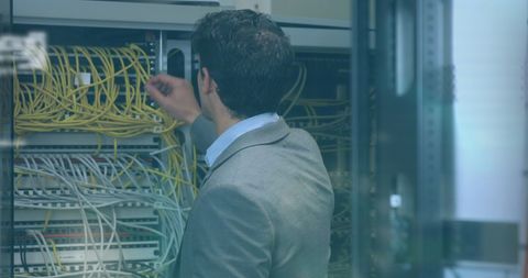 Male IT Technician Managing Server Connection Cables - Download Free Stock Images Pikwizard.com