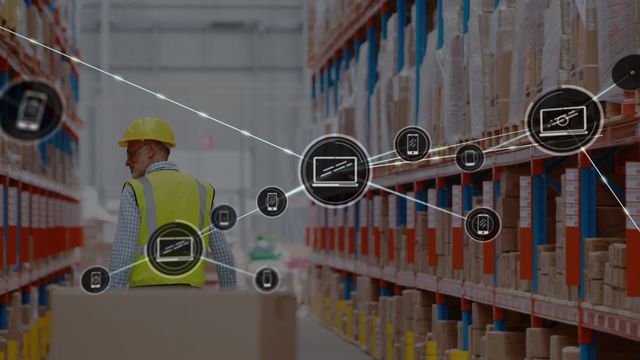 Image depicts a warehouse worker wearing a helmet and safety vest, illustrating integration of smart technology and connection of devices throughout the facility. Ideal for articles on modern logistics solutions, case studies on tech in inventory management, promotional materials for warehouse or supply chain software.