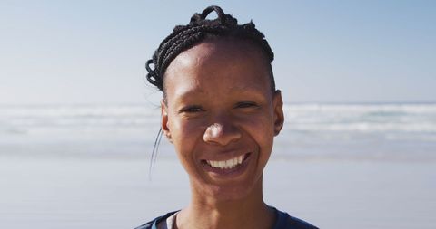 Smiling Young Woman at Sunny Beach - Download Free Stock Images Pikwizard.com