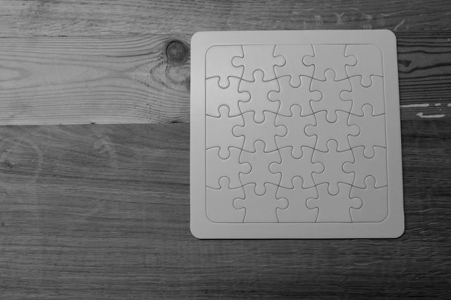 Gray Scale Photo of Jigsaw Puzzle - Download Free Stock Photos Pikwizard.com