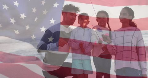 Family Celebrating with American Flag Overlay Outdoors