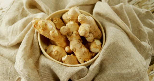 Fresh Raw Ginger Root in Bowl on Rustic Linen - Download Free Stock Images Pikwizard.com