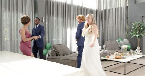 Joyful Bride and Guests Dancing at Modern Wedding Celebration