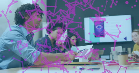 Business Team Analyzing Data with Digital Network Overlay