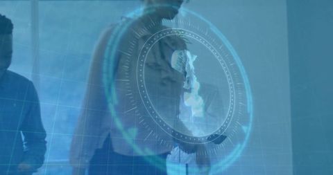 Business professional engaged with futuristic holographic technology