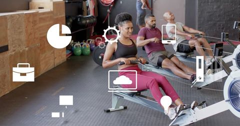 individuals engage in workout activities on indoor rowers, surrounded by overlay of business and technology icons, illustrating fusion of fitness and digital interface. useful for illustrating themes of modern occupational lifestyles, balance between work and fitness, or technology integration in health. great for content on exercise in contemporary society or teamwork through sports.