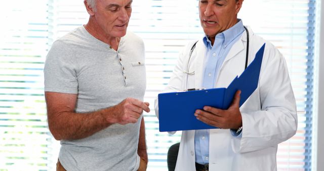 Doctor Discussing Test Results with Elderly Patient - Download Free Stock Images Pikwizard.com