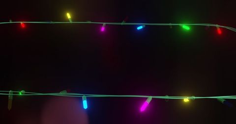 Vibrant Festive String Lights on Dark Background - Download Free Stock Images Pikwizard.com