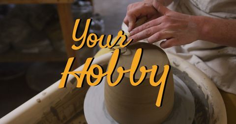 Caucasian woman shaping clay pot on potter's wheel