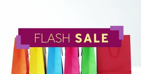 Displaying colorful shopping bags with flash sale banner for retail promotion