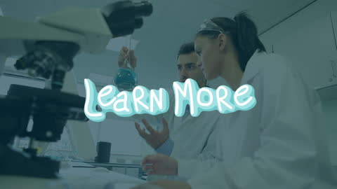 Caucasian Scientists Discussing in Laboratory Setting