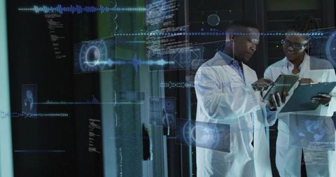 Technicians Reviewing Holographic Data on Tablet and Clipboard in High-Tech Server Room