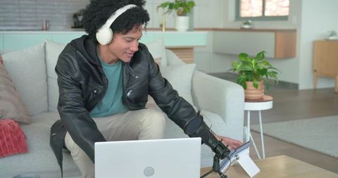 Podcasting and streaming in living room using laptop microphone and headphones