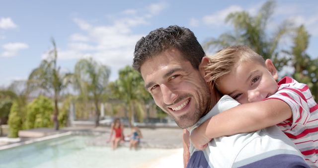 Happy Father and Son Enjoying Pool Time Together - Download Free Stock Images Pikwizard.com