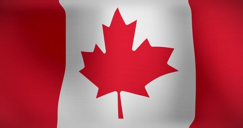The image features the Canadian flag gracefully waving, showcasing its iconic red maple leaf design. Symbolizing both national pride and identity, this imagery is perfect for use in projects related to Canadian culture, national days, travel promotions, and educational materials. Ideal for themes focusing on patriotism and multicultural celebrations.