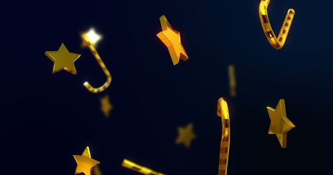Falling gold stars and candy canes on dark background