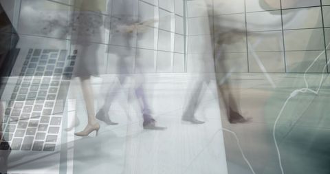 Businesswoman multitasking amidst urban commuters