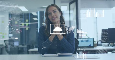 Businesswoman Surrounded by Futuristic Data Visualizations