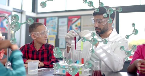 Scientist Demonstrating Experiment to Engaged Students - Download Free Stock Images Pikwizard.com
