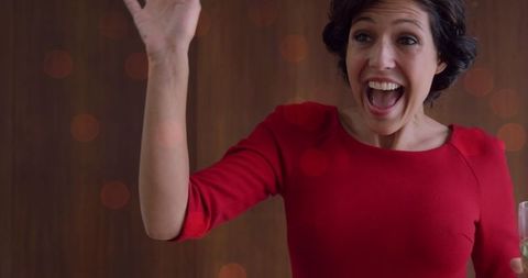 Joyful Woman Celebrating with Champagne in a Festive Mood