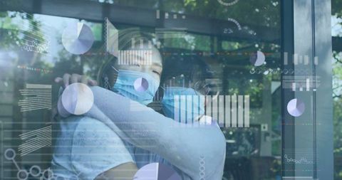 Mother and Daughter in Masks Embracing with Digital Data Overlays