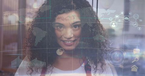 Hispanic woman analyzing digital data overlays in modern office