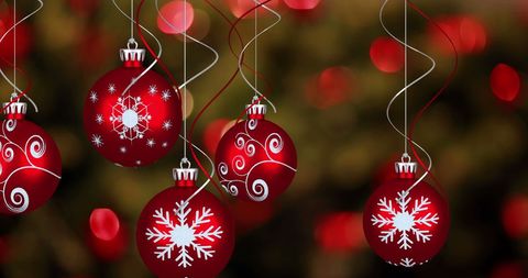 Red Christmas Baubles Hanging Amidst Glowing Lights - Download Free Stock Images Pikwizard.com