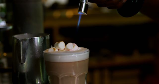 Hand Torching Marshmallows on Gourmet Hot Chocolate Beverage - Download Free Stock Images Pikwizard.com