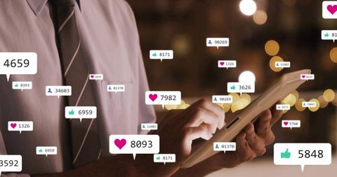 Tapping tablet with social engagement overlays, business analytics, lounge bokeh