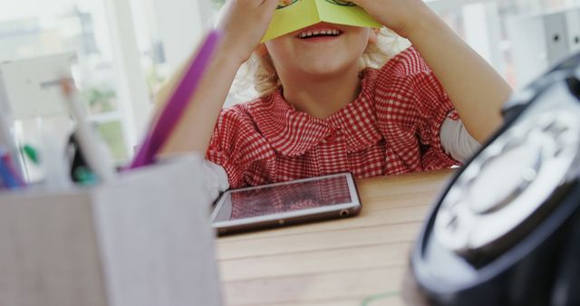 Happy Child Playing with Homemade Toy Binoculars at Home - Download Free Stock Images Pikwizard.com