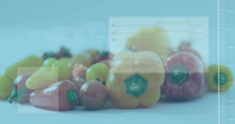 Highlighting Yellow Bell Pepper with Cherry Tomatoes and Futuristic HUD Overlay on Blue Tabletop