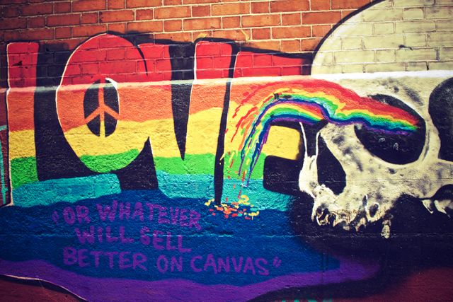 Colorful Love Graffiti Artwork on Urban Brick Wall - Download Free Stock Photos Pikwizard.com