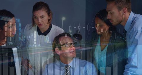 Diverse Team Analyzing Financial Data in Night Office Setting - Download Free Stock Images Pikwizard.com